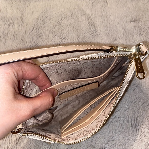 Michael Kors cream and tan wristlet, gold hardware, like new. - Picture 4 of 5